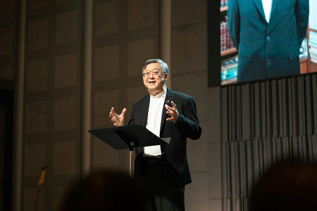 person speaking confidently on stage