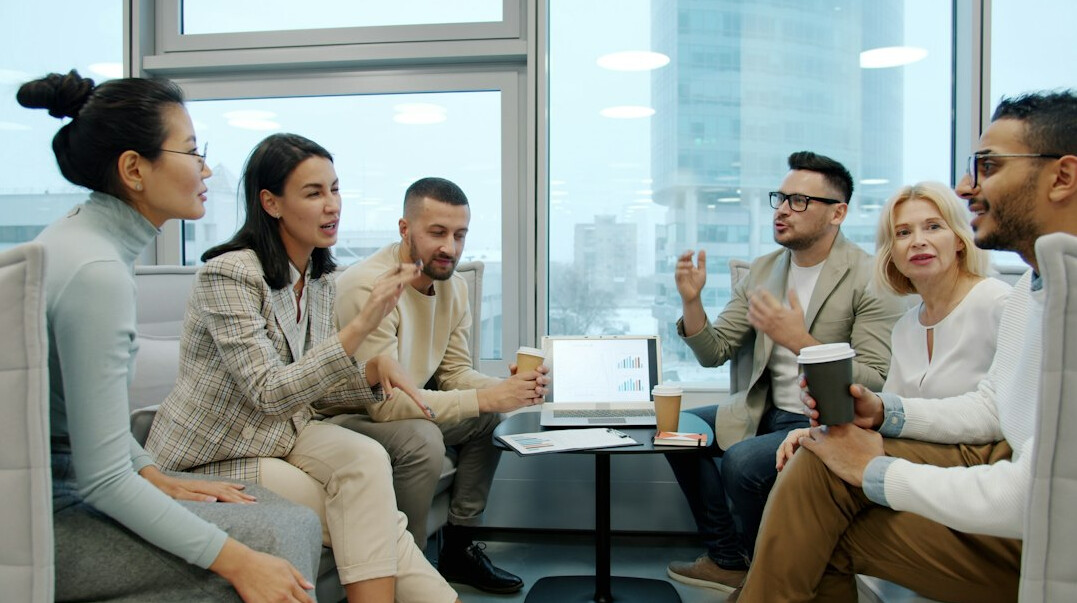 diverse people in deep conversation